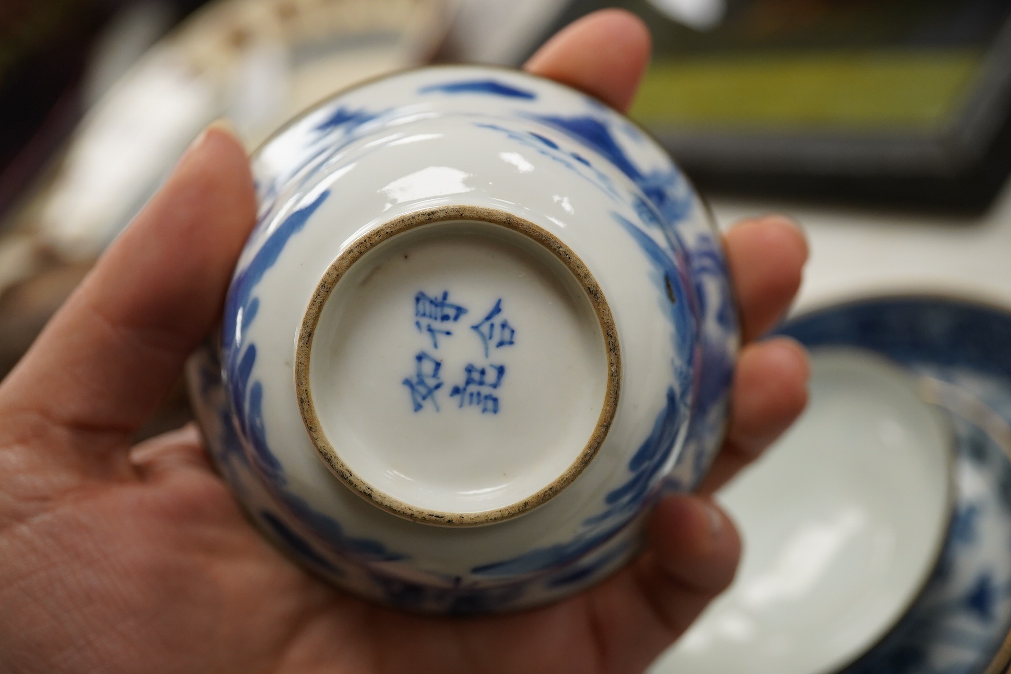 A group of assorted Chinese blue and white tableware. Largest 25cm. Condition - poor to fair